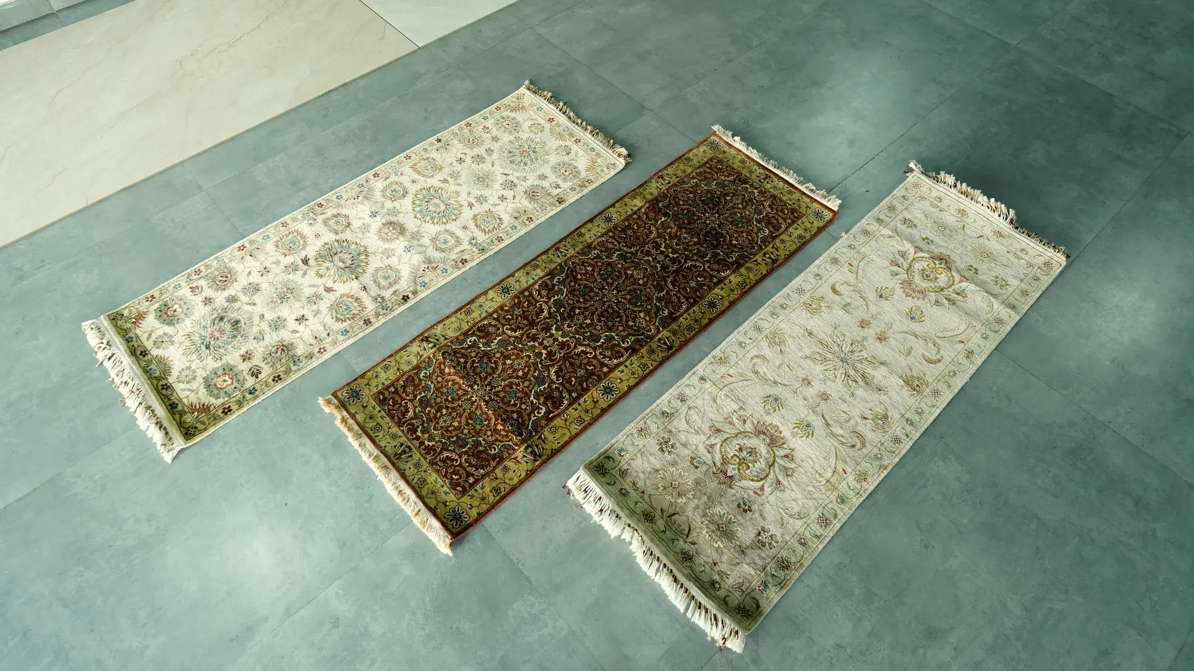 Three hand-knotted runners side by side